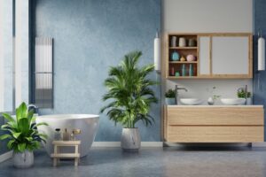 Salle de bain moderne peinture murs bleu grisé et blanc bois clair plantes vertes ambiance fraîche