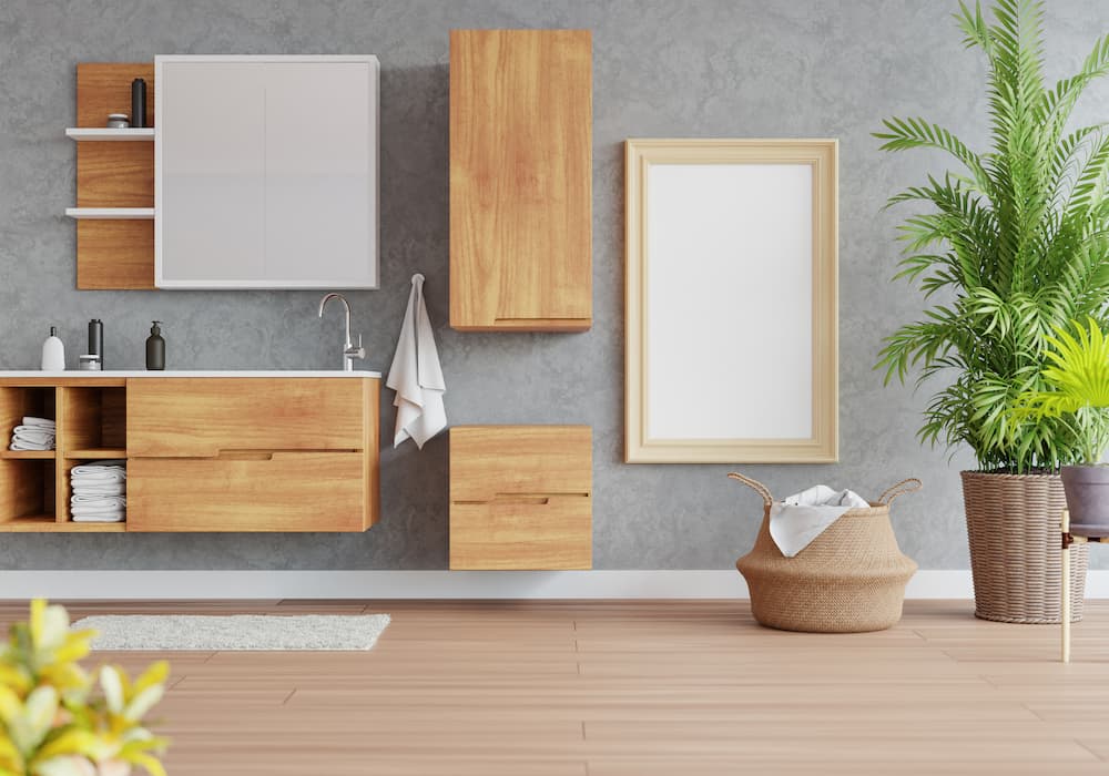 salle de bain contemporaine murs gris meubles bois clair touches naturelles et épurées